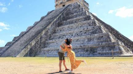 Visitors hugging at Chichen Itza